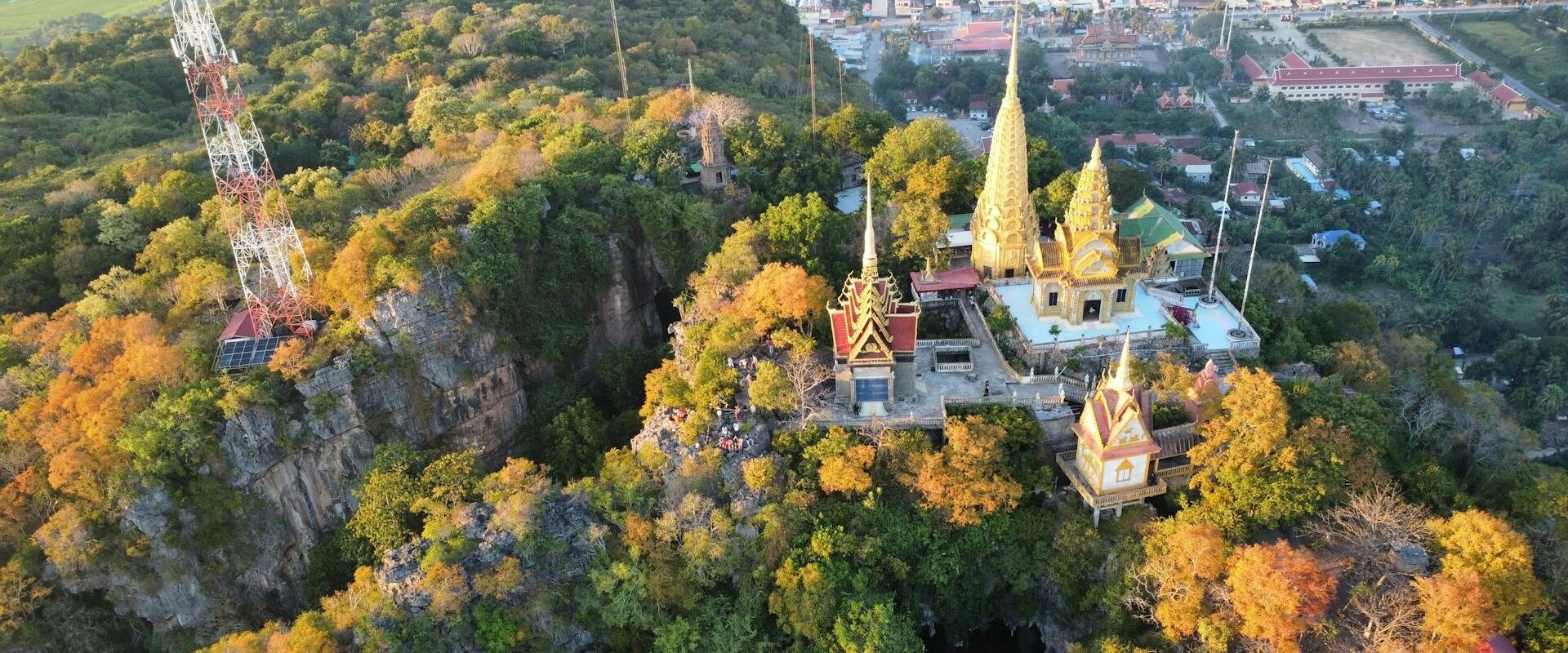Colonial architecture of Battambang in Cambodia on a scenic Battambang Travel banner by Legend Travel Group.